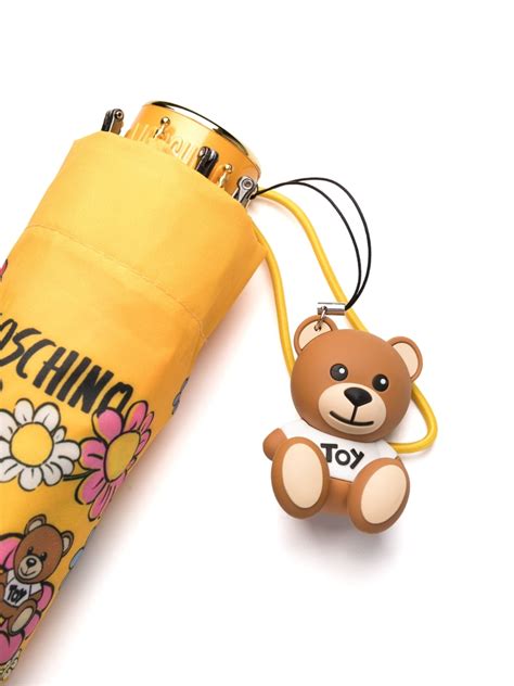 Vergleiche Preise für Moschino Regenschirm mit Teddy .